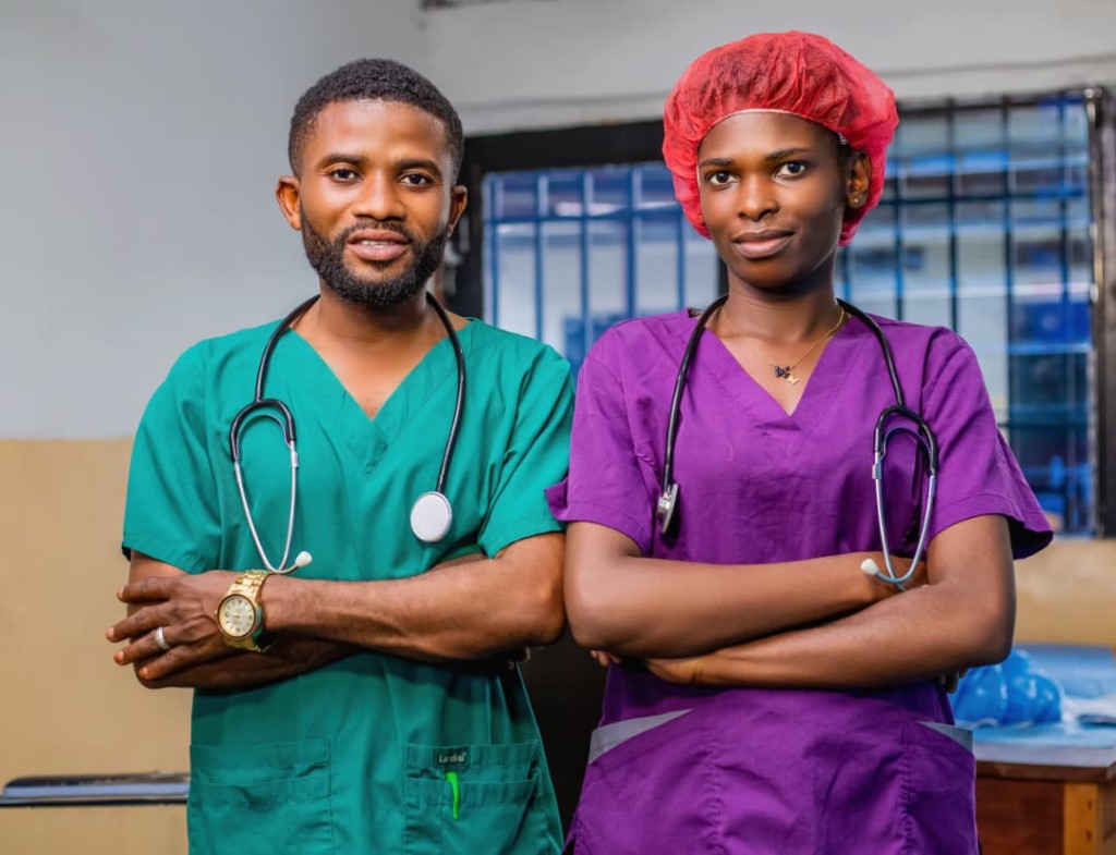 BCP clinic worker caring for a patient